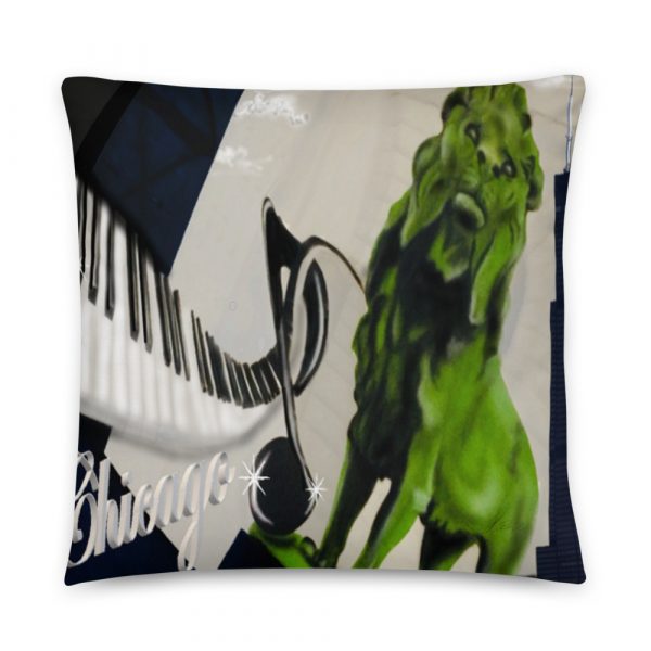 black and white piano keys with green art institute lion and seats tower on pillow