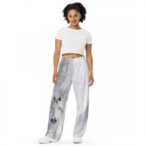 White Beauty Comfy Lounge Pants with white and gray horse airbrushed on leg in snowy background